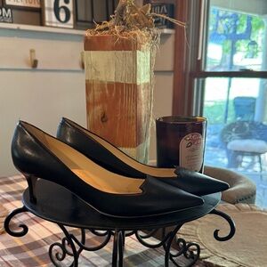 Elegant Black Jimmy Choo Women's Pumps